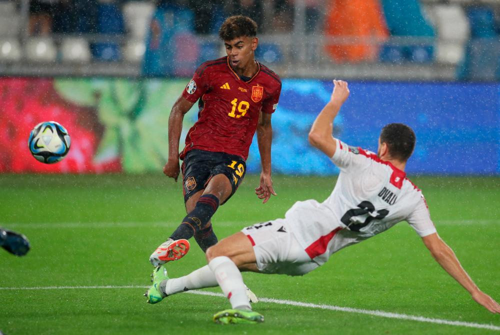 Yamal makes history for Spain as Scotland edge closer to Euros