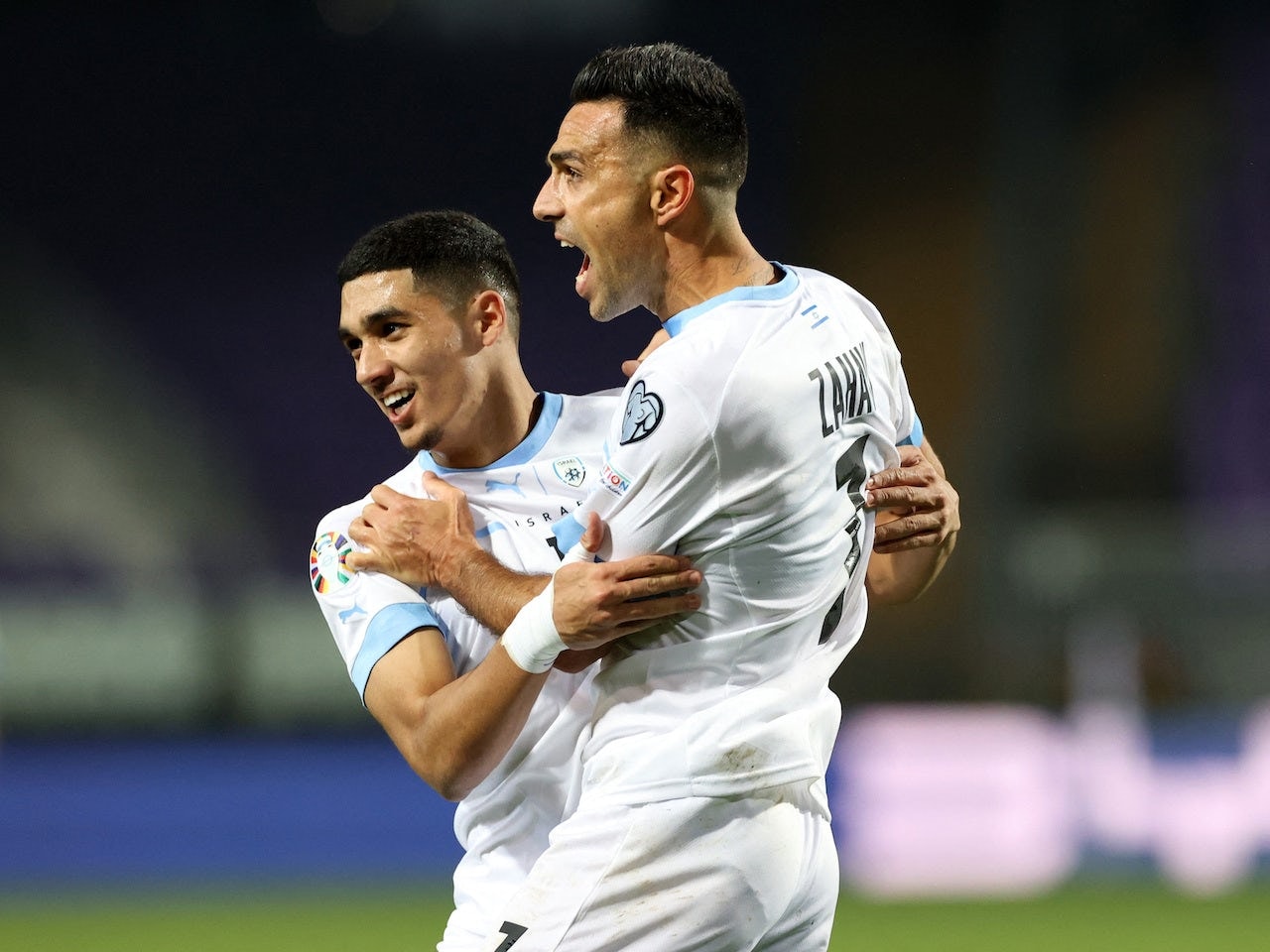 Israel's Eran Zahavi celebrates scoring their first goal with Israel's Anan Khalaili on March 21, 2024