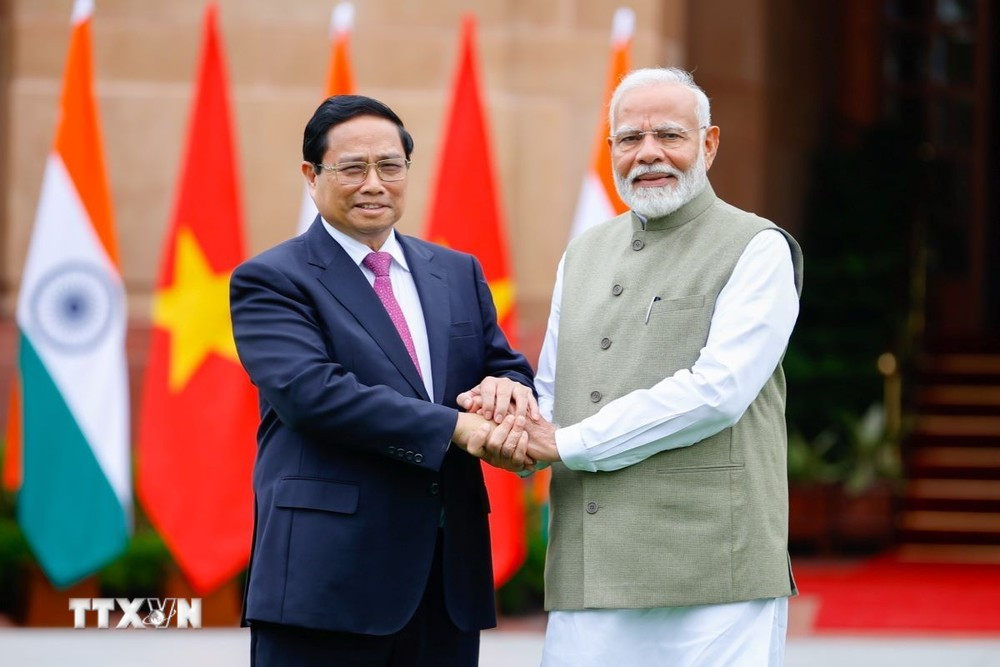 Thủ tướng Phạm Minh Chính​ và Thủ tướng Ấn Độ Narendra Modi. (Ảnh: Dương Giang/TTXVN)