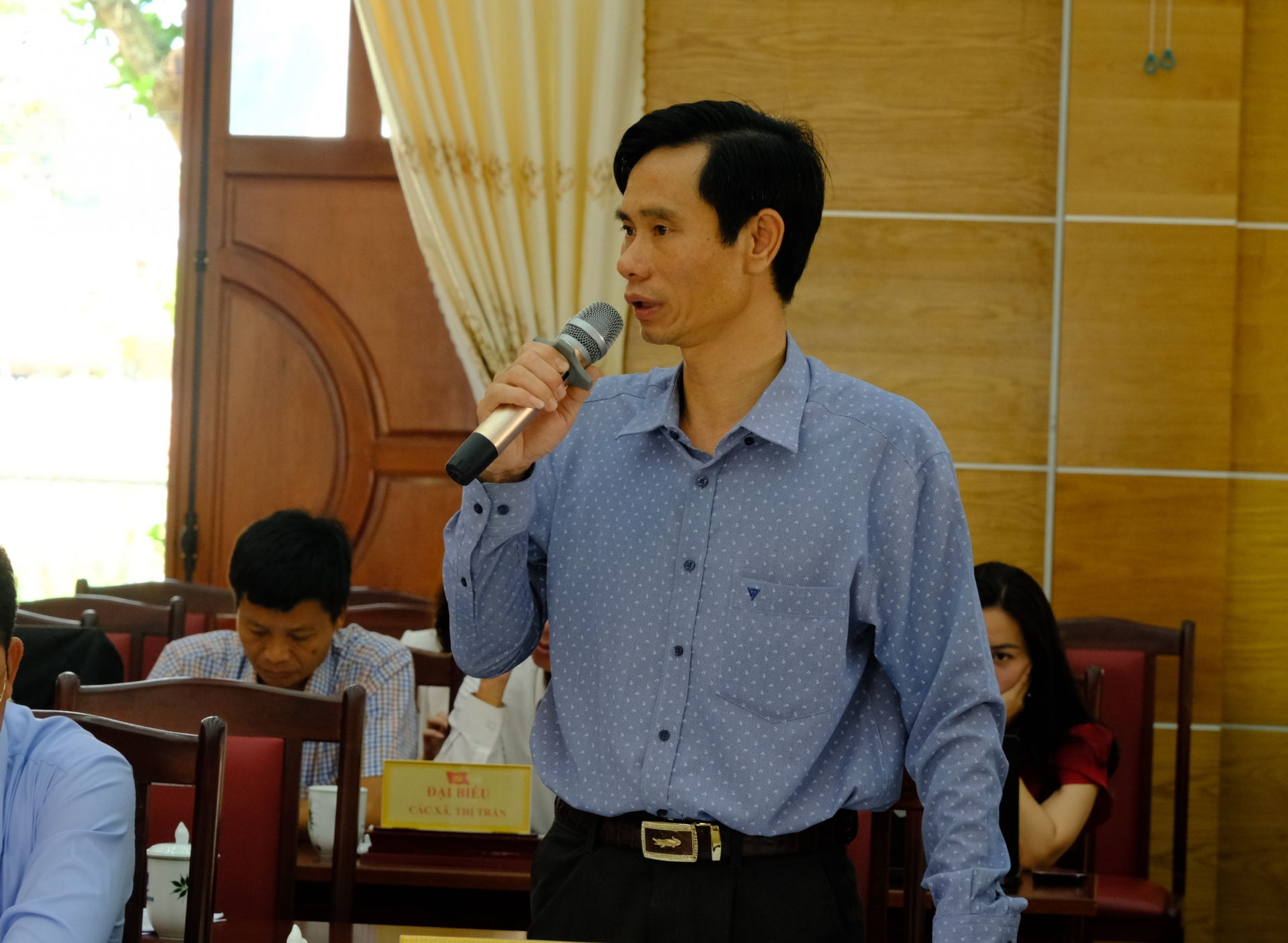 Trưởng Ban Tổ chức Huyện ủy Di  Linh Triệu Trí Kiên báo cáo công tác chuẩn bị Đại hội Đảng các cấp