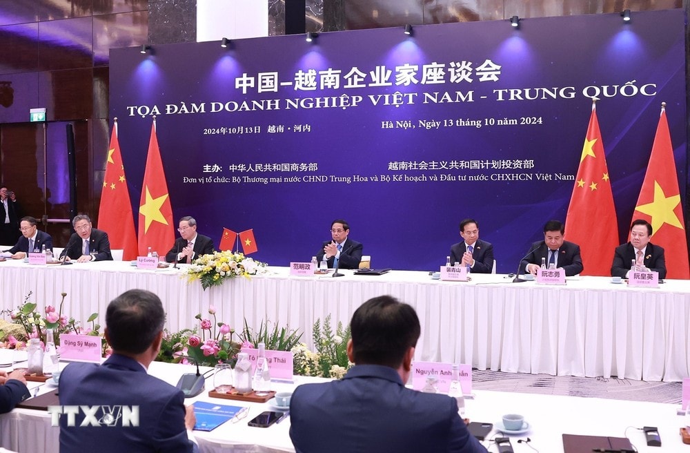 ttxvn_thu_tuong_pham_minh_chinh_va_thu_tuong_trung_quoc_ly_cuong_du_toa_dam_doanh_nghiep_viet_nam-trung_quoc_2.jpg