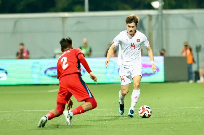 Đội tuyển Việt Nam thắng kịch tính 2-0 Singapore ảnh 1