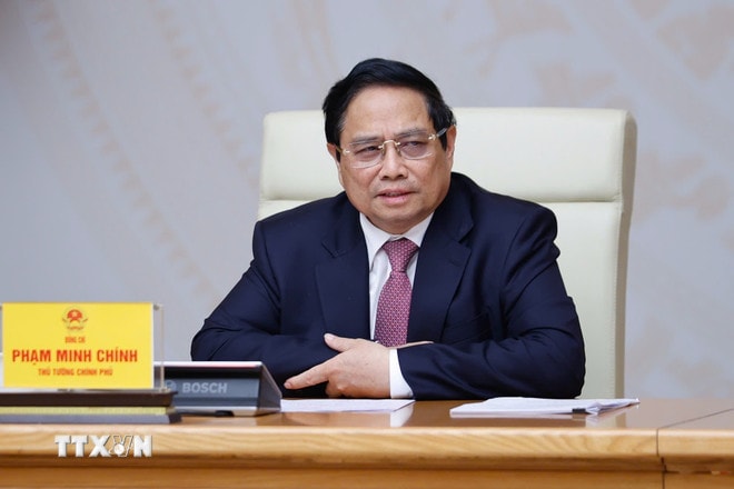 Thủ tướng Phạm Minh Chính chủ trì cuộc họp về cập nhật tình hình và giải pháp ứng phó với chính sách thuế quan của Hoa Kỳ. (Ảnh: Dương Giang/TTXVN) ttxvn-thu-tuong-chinh-sach-thue-quan-2.jpg