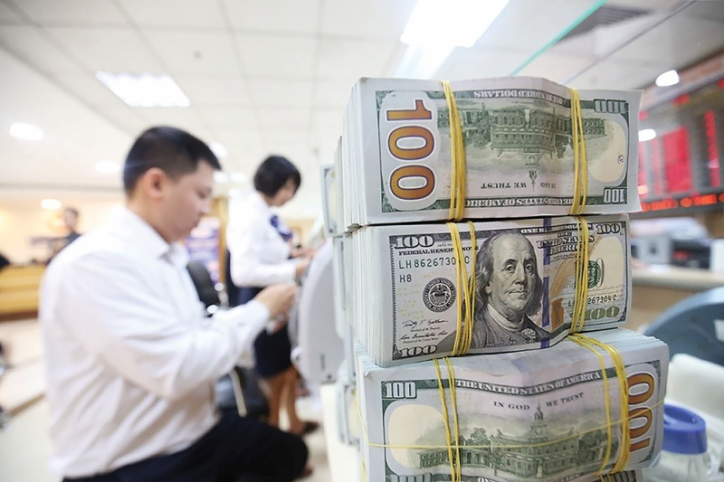 Áp lực trả nợ tăng cao tỷ giá nổi sóng ngầm