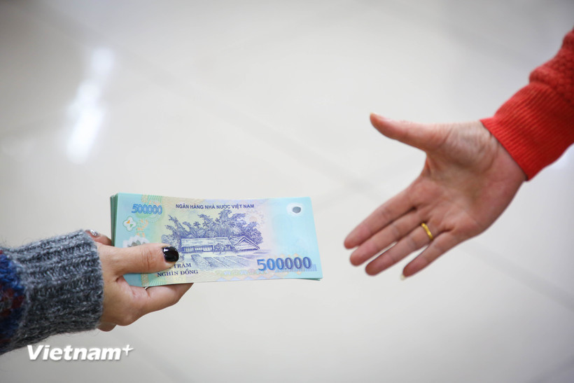 Bộ trưởng Bộ Nội vụ đề nghị người đứng đầu các Bộ, ban, ngành và các địa phương khẩn trương chi trả chính sách, chế độ đối với các trường hợp đã có quyết định nghỉ việc trước ngày 31/8/2025. (Ảnh: PV/Vietnam+)