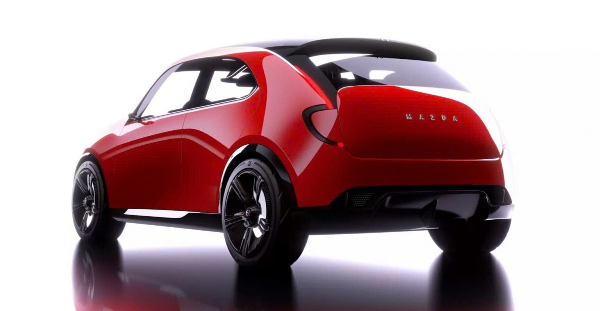 Phần đầu xe Mazda Vision-X Compact với lưới tản nhiệt kín và logo phát sáng