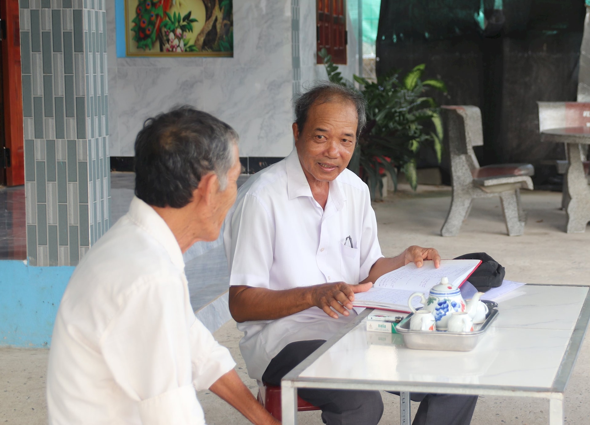 Byhövdingen i Ma Lam 3 propagerar för folket