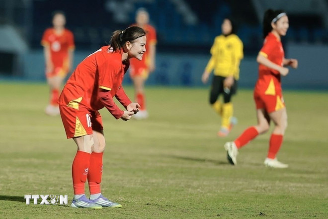 Thái Thị Thảo thi đấu xuất sắc và có hat-trick trong trận đấu ra quân. (Ảnh: Minh Quyết/TTXVN) ttxvn-sea-games-33-viet-nam-dai-thang-tran-ra-quan-gap-nu-malaysia-06-1.jpg