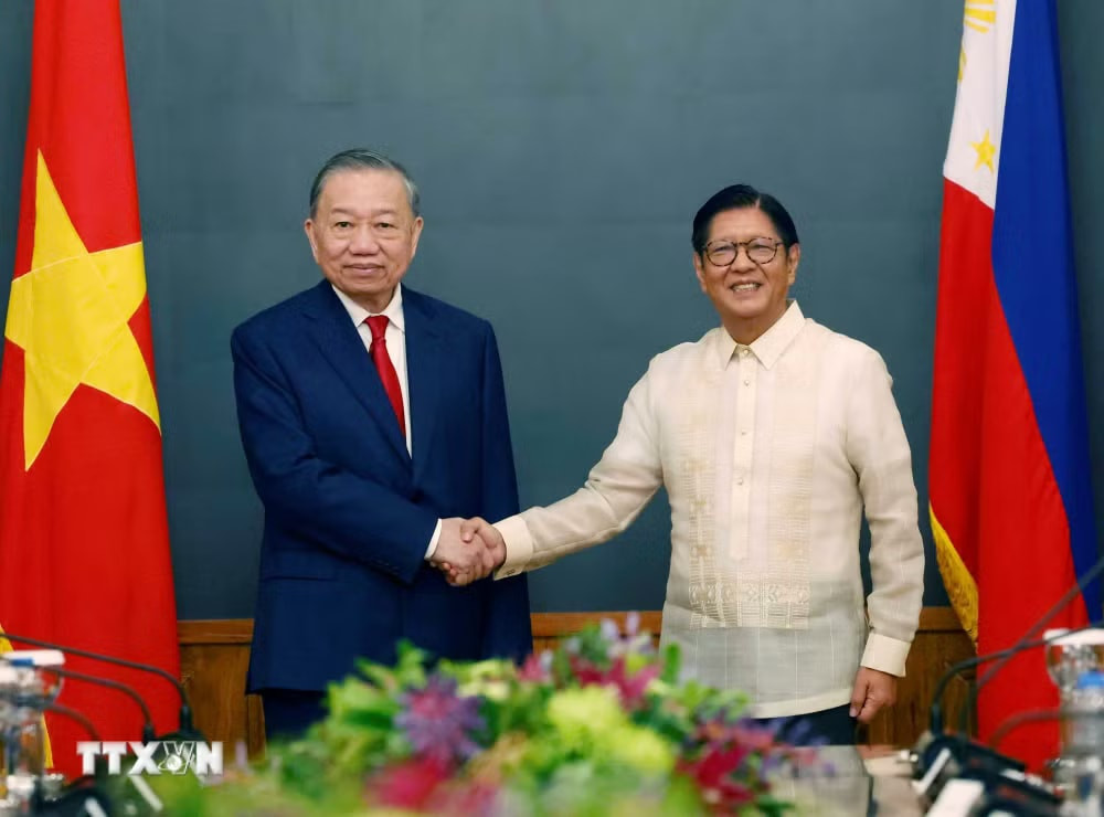 ttxvn-tong-bi-thu-chu-tich-nuoc-to-lam-va-tong-thong-philippines-hoi-dam-0106-8.jpg