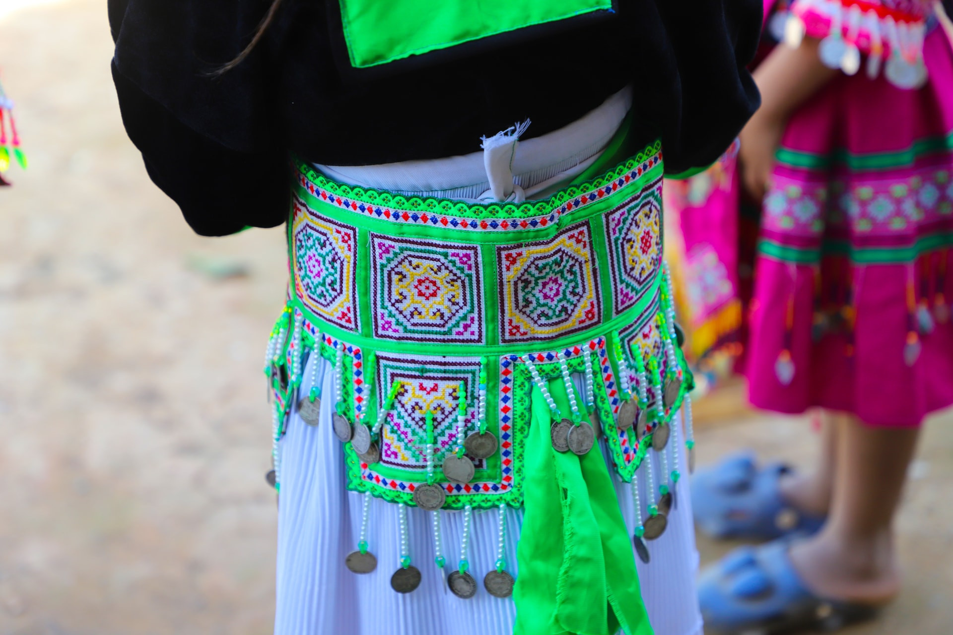 Every pattern and color on the garments carries symbolic meanings related to the universe, nature, and human life.