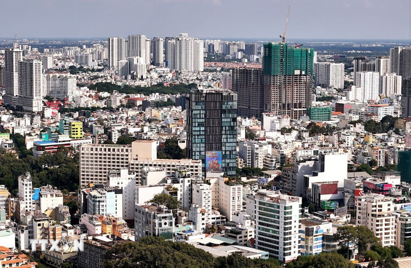 Sở Xây dựng có trách nhiệm gắn mã định danh điện tử cho nhà ở thuộc các dự án phát triển trên địa bàn cùng thời điểm ban hành văn bản thông báo đủ điều kiện bán nhà ở hình thành trong tương lai. (Ảnh: Tuấn Anh/TTXVN)