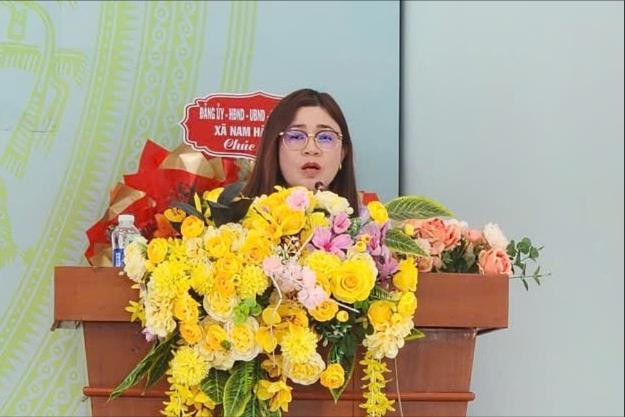 ba-hoang-ngoc-bao-linh-uy-vien-ban-chap-hanh-dang-bo-chanh-van-phong-hdnd-va-ubnd-trinh-bay-chuong-trinh-hanh-dong(1).jpg
