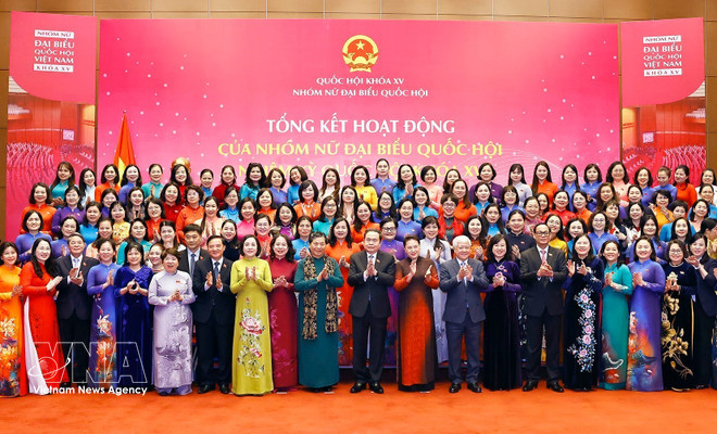 National Assembly Chairman Tran Thanh Man and officials attend a ceremony reviewing the activities of the Group of Women Deputies of the 15th National Assembly in Hanoi on December 9, 2025. (Photo: VNA) National Assembly Chairman Tran Thanh Man and officials attend a ceremony reviewing the activities of the Group of Women Deputies of the 15th National Assembly in Hanoi on December 9, 2025. (Photo: VNA)