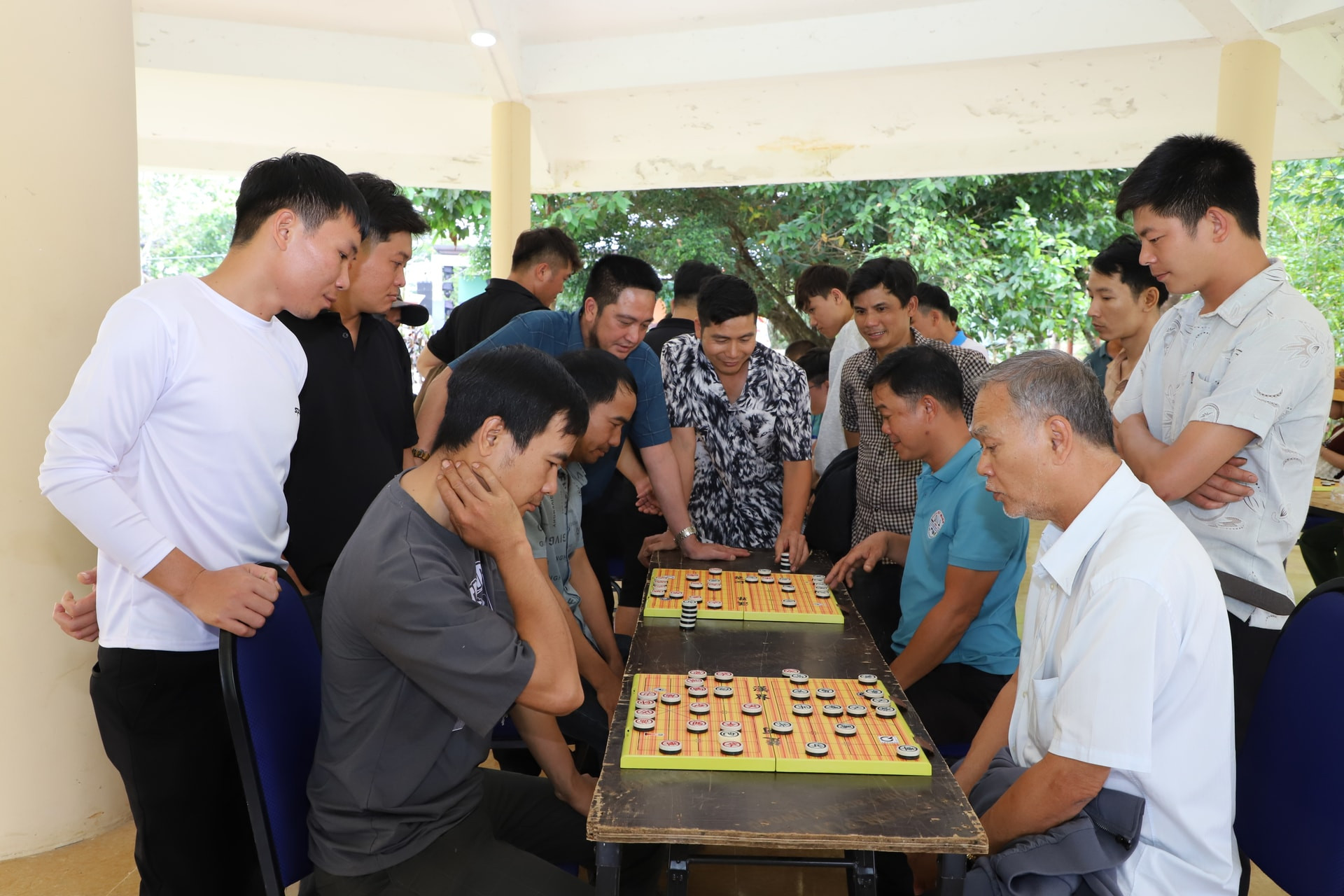 Springtime chess boards become gathering spots for interaction and connection across generations.