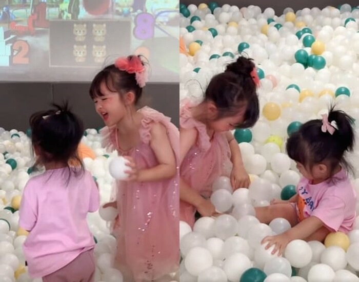 Dù còn nhỏ, cô bé đã biết nhường nhịn em gái khi chơi chung.