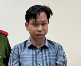 Đối tượng Đào Chí Nguyện tại cơ quan công an