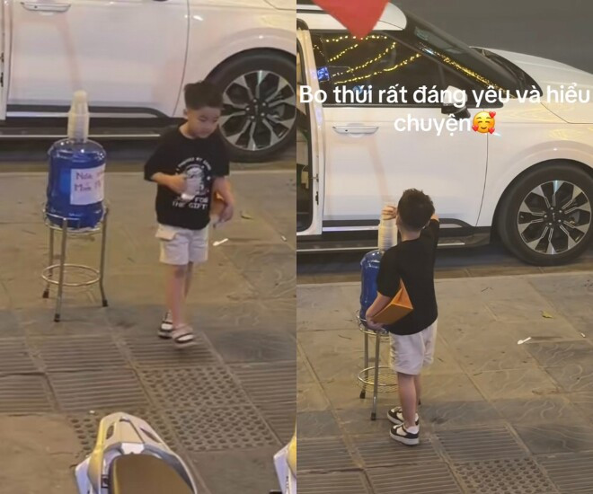 Con trai Hòa Minzy thoải mái uống nước miễn phí trên vỉa hè.