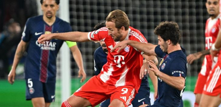 Kane được hàng thủ PSG chăm sóc kỹ lưỡng.