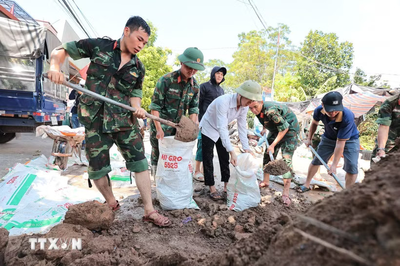 Chủ động phòng chống thiên tai, bão lũ. (Ảnh: Lê Đông/TTXVN)