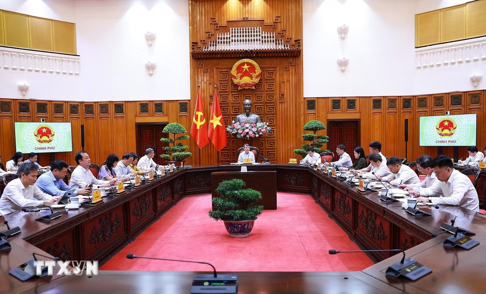 ttxvn-thu-tuong-le-minh-hung-hop-ve-phat-trien-trung-tam-tai-chinh-quoc-te-tai-viet-nam-02-2.jpg