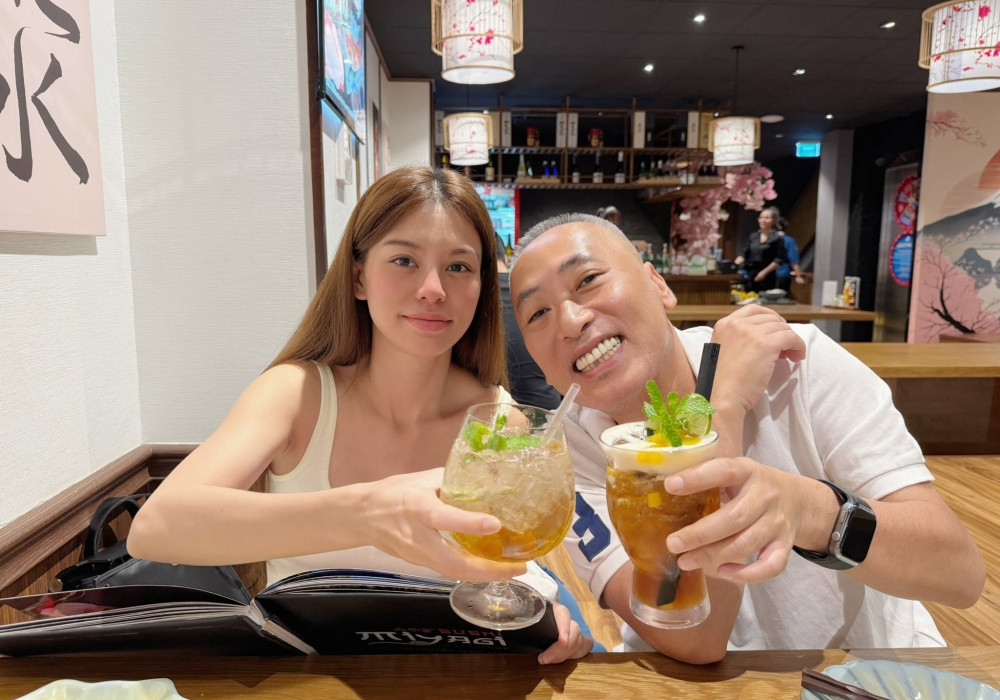 Nguyễn Quang Dũng và ca sĩ Bùi Lan Hương trong cuộc sống đời thường.
