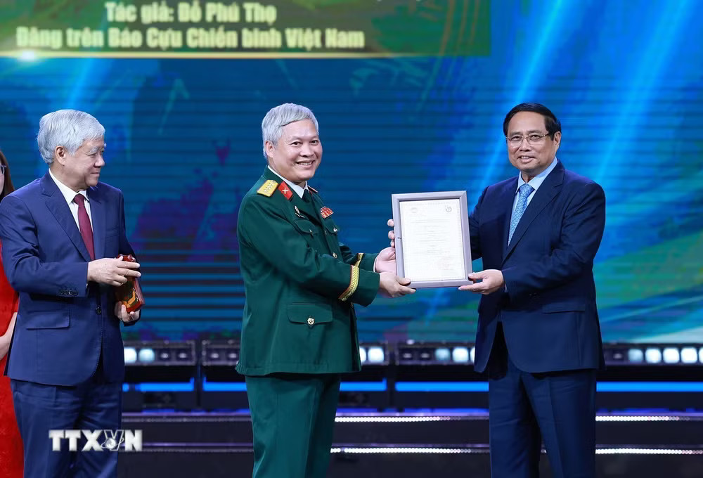 ttxvn-nha-bao-do-phu-tho.jpg
