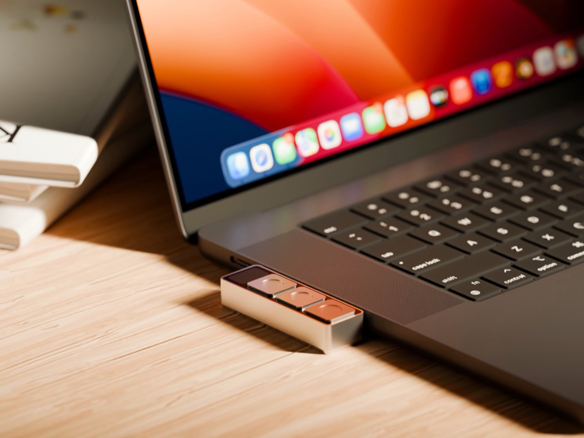 Thiết kế bàn phím Dune với ba nút bấm thông minh gắn trên MacBook
