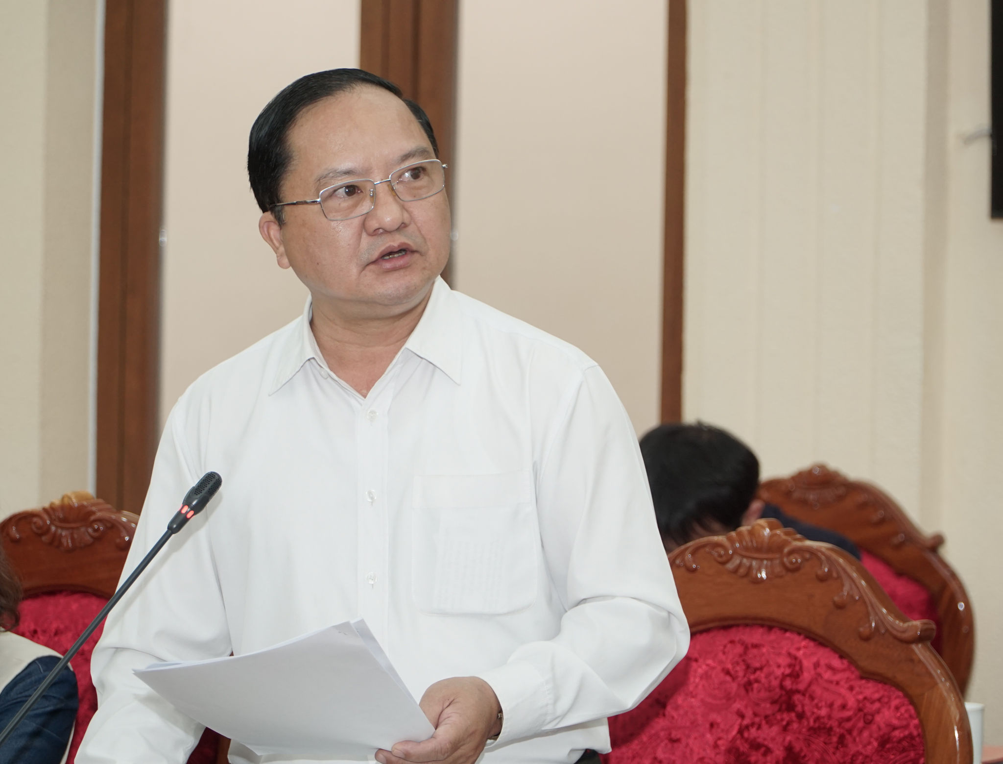 Lãnh đạo Ủy ban MTTQVN tỉnh báo cáo tại hội nghị