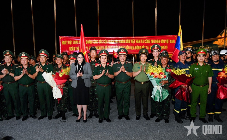 Đoàn cứu hộ, cứu nạn Việt Nam trở về nước, hoàn thành nhiệm vụ tại Venezuela- Ảnh 1.