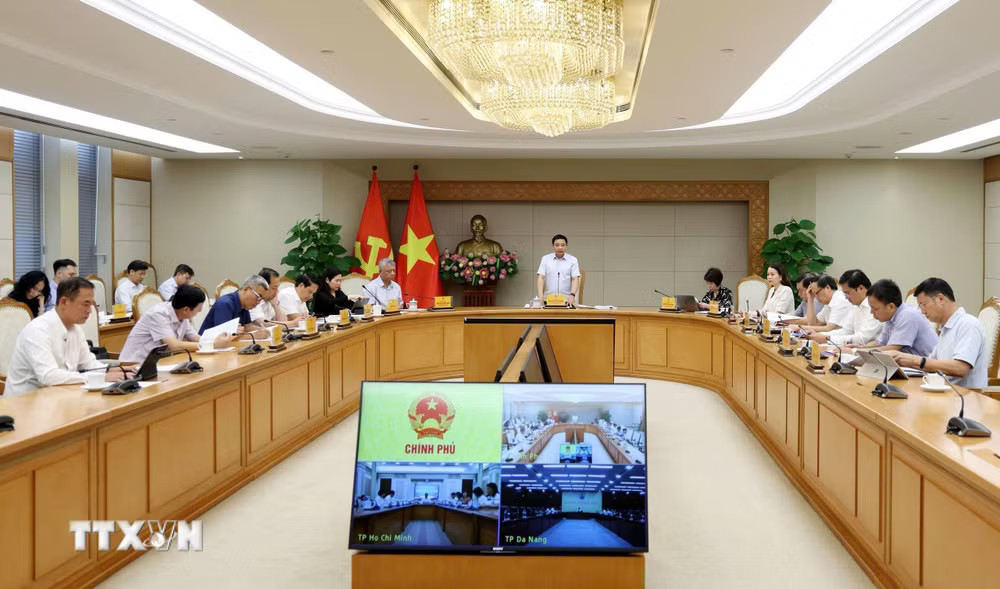 ttxvn-pho-thu-tuong-nguyen-van-thang-hop-hoi-dong-dieu-hanh-trung-tam-tai-chinh-quoc-te-tai-viet-nam-0709-2.jpg