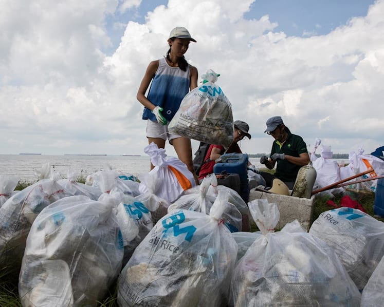 Bags of marine litter collected by volunteers during a clean-up at Tanah Merah Beach on June 5, 2022