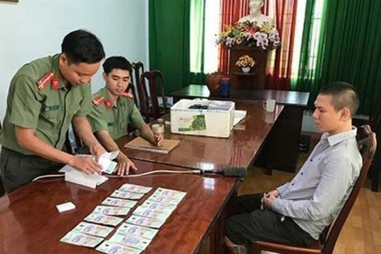 Cảnh giác với tội phạm tiêu thụ tiền giả
