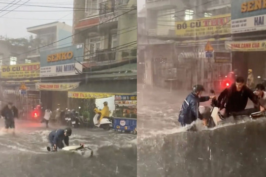 'Sốt' clip 3 thanh niên lao ra cứu chiếc xe máy bị mưa lớn cuốn trôi ở TP.HCM