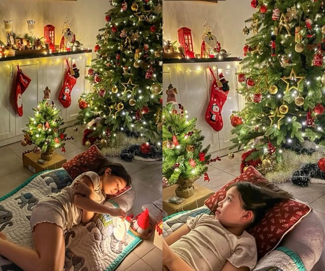 Con gái siêu mẫu Hà Anh ngủ cạnh cây thông chờ Giáng sinh